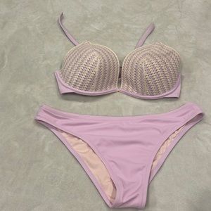 Woman’s purple and White Bikini